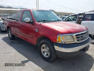 2002 Ford F-150 XL with VIN 1FTRX17LX2NB30978, listed as a IAAI auction lot 41979756 with 225,030 mi miles. Bid and sale history available at carsss.com. Image 1.