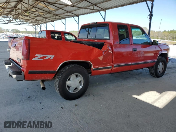 1997 Chevrolet Silverado 1500 with VIN 1GCEK19R1VE137711, listed as a Copart auction lot 50542465 with 297,338 mi miles and Salvage Title. Bid and sale history available at DreamBid. Image 3.
