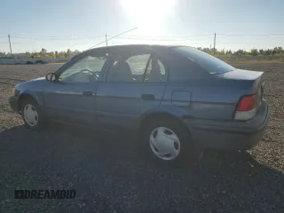 1999 Toyota Tercel z VIN JT2BC53L9X0354072, wystawiony jako Copart lot #73050384 z przebiegiem 163 566 mil mil oraz Szkody całkowita. Historia ofert i sprzedaży dostępna na DreamBid. Obrazek 2.