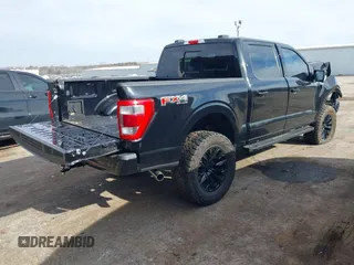 2023 Ford F-150 XL with VIN 1FTFW1E88PKE81241, listed as a IAAI auction lot 41235511 with 14,896 mi miles. Bid and sale history available at carsss.com. Image 4.
