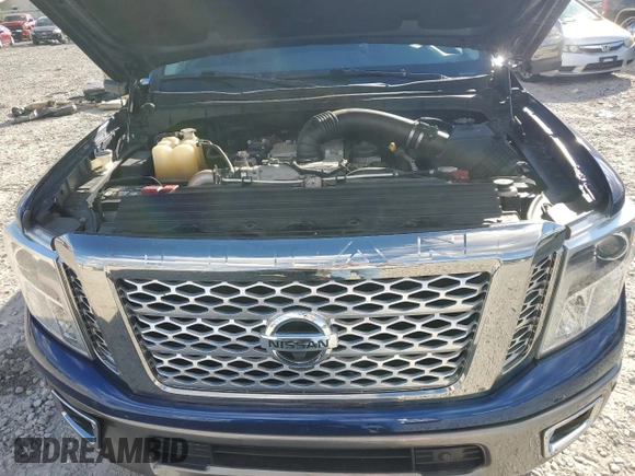 2016 Nissan Titan XD Platinum Reserve with VIN 1N6BA1F46GN512586, listed as a Copart auction lot 82406194 with 115,666 mi miles and Salvage Title. Bid and sale history available at carsss.com. Image 7.