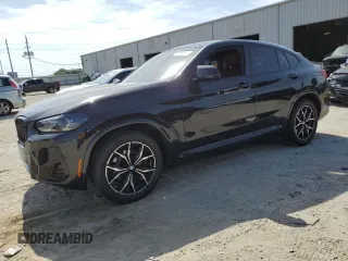 2023 BMW X4 xDrive30i z VIN 5UX33DT01P9N72142, wystawiony jako Copart lot #53689735 z przebiegiem 63 020 mil mil oraz Szkoda całkowita • Salvage title. Historia ofert i sprzedaży dostępna na DreamBid. Obrazek 1.