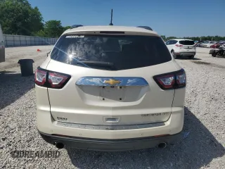 2014 Chevrolet Traverse LTZ z VIN 1GNKRJKD7EJ175097, wystawiony jako Copart lot #56717045 z przebiegiem 113 041 mil mil oraz Szkoda całkowita • Salvage title. Historia ofert i sprzedaży dostępna na DreamBid. Obrazek 6.