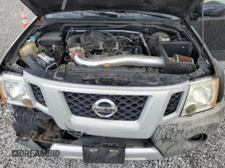 2010 Nissan Xterra S with VIN 5N1AN0NW8AC506660, listed as a Copart auction lot 55810805 with 203,227 mi miles and Salvage title. Bid and sale history available at DreamBid. Image 12.