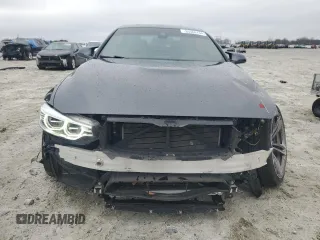 2015 BMW M4 z VIN WBS3U9C5XFP968001, wystawiony jako Copart lot #85566764 z przebiegiem 26 927 mil mil oraz Szkoda całkowita • Salvage title. Historia ofert i sprzedaży dostępna na DreamBid. Obrazek 5.