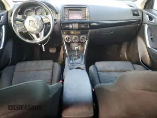 2014 Mazda CX-5 Touring с VIN JM3KE2CY3E0308740, выставлен на аукционе Copart как лот 88127365 с пробегом 137 690 миль миль и Списание • Salvage title. История ставок и продаж доступна на DreamBid. Изображение 8.