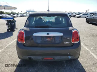 2014 MINI Hardtop with VIN WMWXM5C57ET934120, listed as a Copart auction lot 58594845 with 115,248 mi miles and Salvage title. Bid and sale history available at DreamBid. Image 6.