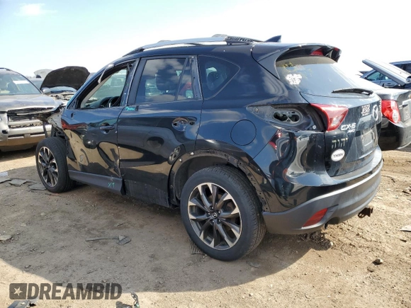 2016 Mazda CX-5 Grand Touring with VIN JM3KE4DY8G0719113, listed as a Copart auction lot 52160285 with 259,365 mi miles and Salvage Title. Bid and sale history available at carsss.com. Image 2.