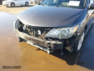 2014 Toyota Camry Hybrid LE with VIN 4T1BD1FK8EU135234, listed as a IAAI auction lot 41399246 with 104,964 mi miles. Bid and sale history available at carsss.com. Image 6.