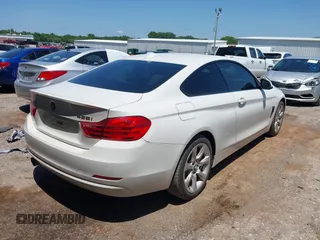 2015 BMW 4 Series 428i xDrive with VIN WBA3N5C58FK198596, listed as a IAAI auction lot 42514820 with 107,261 mi miles and . Bid and sale history available at DreamBid. Image 4.