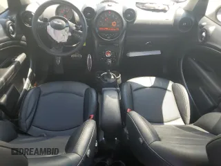 2016 MINI Countryman S with VIN WMWZC5C51GWU00690, listed as a Copart auction lot 55077095 with 104,176 mi miles and Salvage title. Bid and sale history available at DreamBid. Image 8.