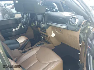 2016 Jeep Wrangler Unlimited 75th Anniversary with VIN 1C4BJWEG2GL161375, listed as a IAAI auction lot 41998100 with 108,495 mi miles. Bid and sale history available at carsss.com. Image 5.