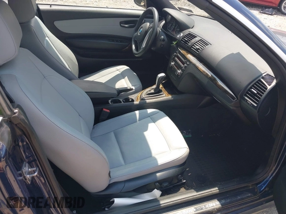 2012 BMW 1 Series 128i with VIN WBAUN1C56CVR00132, listed as a IAAI auction lot 42387792 with 122,741 mi miles and . Bid and sale history available at DreamBid. Image 5.