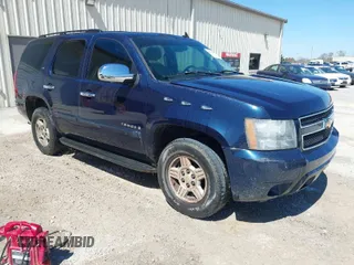 2007 Chevrolet Tahoe LTZ with VIN 1GNFC13077R243921, listed as a IAAI auction lot 41856659 with Not provided miles and . Bid and sale history available at DreamBid. Image 1.