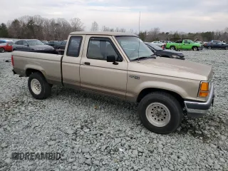 1991 Ford Ranger with VIN 1FTCR15TXMPA56374, listed as a Copart auction lot 47278065 with 64,948 mi miles and Clean Title. Bid and sale history available at DreamBid. Image 4.