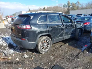 2019 Jeep Cherokee Altitude with VIN 1C4PJMLB0KD319703, listed as a IAAI auction lot 41524781 with 181,625 mi miles and . Bid and sale history available at DreamBid. Image 4.