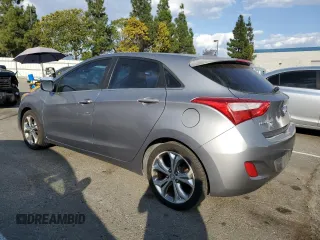 2013 Hyundai Elantra GT with VIN KMHD35LE2DU098164, listed as a Copart auction lot 77272174 with 165,061 mi miles and Salvage Title. Bid and sale history available at carsss.com. Image 2.