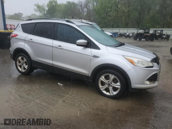 2014 Ford Escape SE with VIN 1FMCU0G90EUC27903, listed as a Copart auction lot 51216885 with 133,948 mi miles and Salvage Title. Bid and sale history available at carsss.com. Image 4.