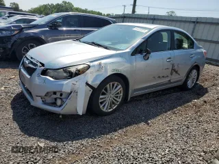 2015 Subaru Impreza Premium with VIN JF1GJAK62FH023119, listed as a Copart auction lot 61233025 with 197,137 mi miles and Salvage title. Bid and sale history available at DreamBid. Image 1.