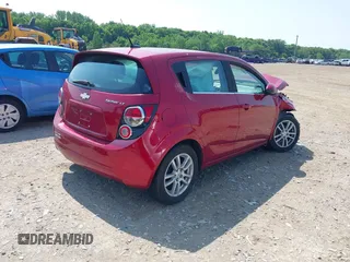 2012 Chevrolet Sonic LT with VIN 1G1JC6SH7C4135418, listed as a IAAI auction lot 42464564 with 169,035 mi miles and . Bid and sale history available at DreamBid. Image 4.