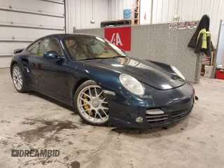2011 Porsche 911 Turbo with VIN WP0AD2A93BS766801, listed as a IAAI auction lot 41566167 with 66,785 mi miles. Bid and sale history available at carsss.com. Image 1.