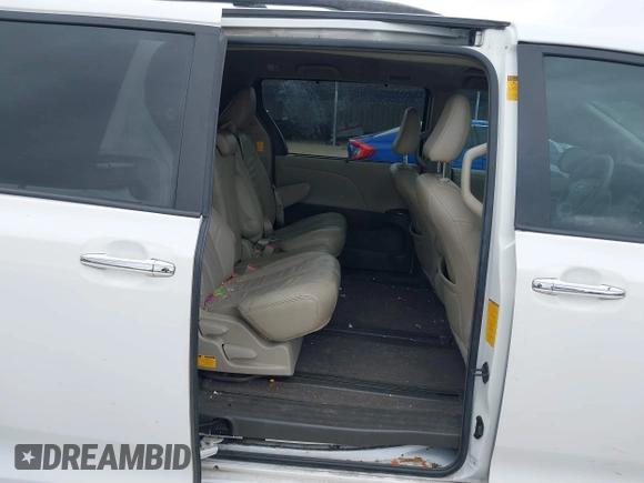 2014 Toyota Sienna XLE z VIN 5TDYK3DC5ES439511, wystawiony jako IAAI lot #41510779 z przebiegiem 218 782 mil mil oraz . Historia ofert i sprzedaży dostępna na DreamBid. Obrazek 8.