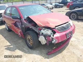 2007 Toyota Corolla CE z VIN JTDBR32E570111498, wystawiony jako IAAI lot #42417995 z przebiegiem 299 999 mil mil oraz . Historia ofert i sprzedaży dostępna na DreamBid. Obrazek 6.