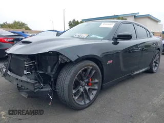 2020 Dodge Charger Scat Pack z VIN 2C3CDXGJ7LH192448, wystawiony jako IAAI lot #41884566 z przebiegiem 29 471 mil mil oraz . Historia ofert i sprzedaży dostępna na DreamBid. Obrazek 2.