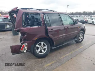 2007 Honda Pilot EX-L with VIN 2HKYF18547H533084, listed as a IAAI auction lot 41729988 with 199,886 mi miles and . Bid and sale history available at DreamBid. Image 4.