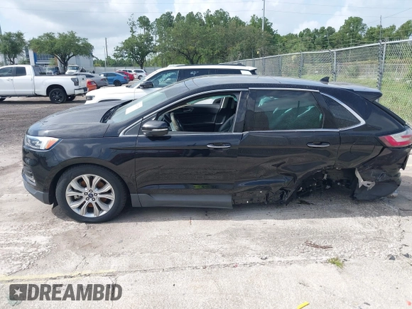 2020 Ford Edge Titanium with VIN 2FMPK4K93LBA05221, listed as a IAAI auction lot 42497787 with Not provided miles and . Bid and sale history available at DreamBid. Image 13.