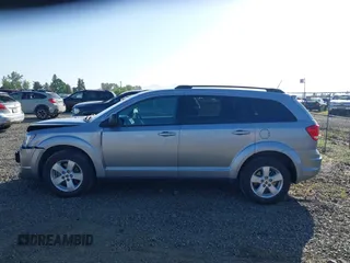 2018 Dodge Journey SE with VIN 3C4PDDAG9JT189824, listed as a IAAI auction lot 42208115 with 97,035 mi miles and . Bid and sale history available at DreamBid. Image 14.