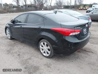 2012 Hyundai Elantra GLS with VIN KMHDH4AE4CU217877, listed as a IAAI auction lot 41927929 with 999,999 mi miles. Bid and sale history available at carsss.com. Image 3.