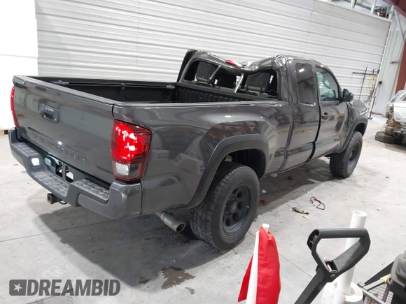 2021 Toyota Tacoma SR with VIN 3TYRX5GN8MT011370, listed as a IAAI auction lot 41287330 with 73,447 mi miles and . Bid and sale history available at DreamBid. Image 4.