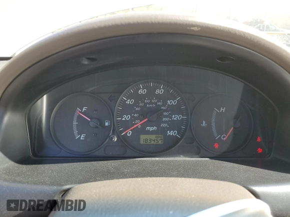 2002 Mazda Protege DX with VIN JM1BJ225520525472, listed as a Copart auction lot 45699915 with 183,457 mi miles and Salvage Title. Bid and sale history available at DreamBid. Image 9.