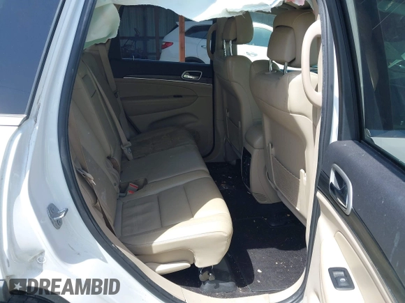 2019 Jeep Grand Cherokee Limited with VIN 1C4RJEBG8KC572978, listed as a IAAI auction lot 42247099 with 128,059 mi miles and . Bid and sale history available at DreamBid. Image 8.