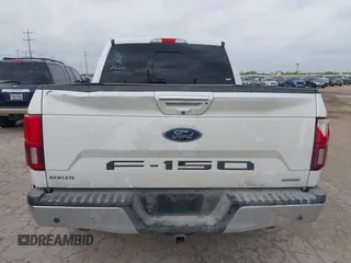 2018 Ford F-150 XL with VIN 1FTEW1EG5JKD32988, listed as a IAAI auction lot 42099086 with 127,541 mi miles. Bid and sale history available at carsss.com. Image 15.