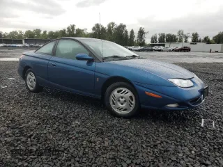2001 Saturn SC with VIN 1G8ZR12791Z118164, listed as a Copart auction lot 74393904 with 158,308 mi miles and Salvage Title. Bid and sale history available at carsss.com. Image 4.