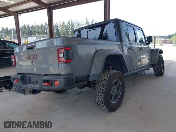 2022 Jeep Gladiator Rubicon with VIN 1C6JJTBG6NL166081, listed as a IAAI auction lot 42204431 with 40,568 mi miles and . Bid and sale history available at DreamBid. Image 4.