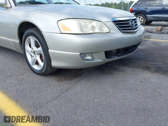 2002 Mazda Millenia with VIN JM1TA221721722364, listed as a IAAI auction lot 42160683 with 166,778 mi miles and . Bid and sale history available at DreamBid. Image 6.