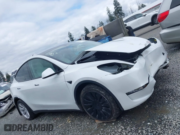 2023 Tesla Model Y Long Range z VIN 7SAYGAEEXPF647352, wystawiony jako IAAI lot #41955933 z przebiegiem Nie podano mil oraz . Historia ofert i sprzedaży dostępna na DreamBid. Obrazek 14.