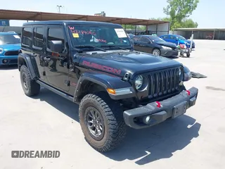 2020 Jeep Wrangler Unlimited Rubicon z VIN 1C4HJXFN9LW291112, wystawiony jako IAAI lot #42189090 z przebiegiem 107 215 mil mil oraz . Historia ofert i sprzedaży dostępna na DreamBid. Obrazek 1.