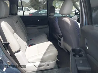 2016 Honda Pilot EX-L with VIN 5FNYF5H53GB028711, listed as a IAAI auction lot 41916433 with 162,895 mi miles and . Bid and sale history available at DreamBid. Image 8.