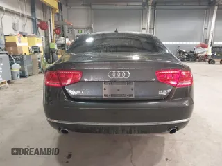 2012 Audi A8 z VIN WAURVAFD6CN014546, wystawiony jako IAAI lot #41357932 z przebiegiem 93 516 mil mil oraz . Historia ofert i sprzedaży dostępna na DreamBid. Obrazek 16.