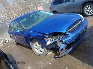 2003 Ford Taurus SE Standard with VIN 1FAFP53233G208763, listed as a IAAI auction lot 41661923 with 127,830 mi miles. Bid and sale history available at carsss.com. Image 1.