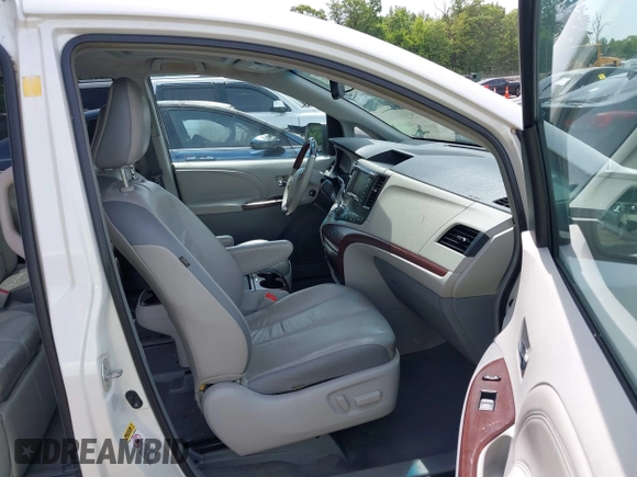 2011 Toyota Sienna XLE AAS with VIN 5TDYK3DC0BS008439, listed as a IAAI auction lot 42292552 with 115,162 mi miles and . Bid and sale history available at DreamBid. Image 5.
