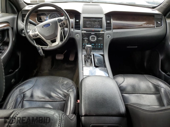 2013 Ford Taurus Limited с VIN 1FAHP2F89DG226774, выставлен на аукционе Copart как лот 57250415 с пробегом 233 149 миль миль и Списание • Salvage title. История ставок и продаж доступна на DreamBid. Изображение 8.