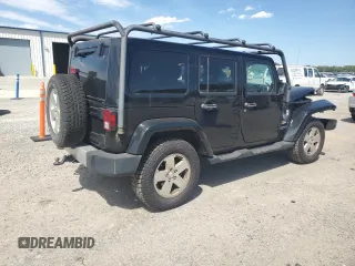 2012 Jeep Wrangler Unlimited Sahara with VIN 1C4HJWEG5CL205826, listed as a Copart auction lot 58222115 with 98,940 mi miles and Salvage title. Bid and sale history available at DreamBid. Image 3.