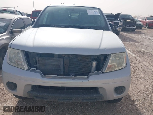 2014 Nissan Frontier SV with VIN 1N6AD0ER0EN759772, listed as a IAAI auction lot 41479252 with 153,630 mi miles and . Bid and sale history available at DreamBid. Image 6.