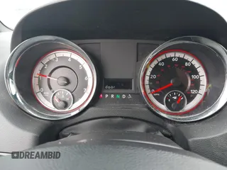 2015 Dodge Grand Caravan SE with VIN 2C4RDGBG8FR669355, listed as a IAAI auction lot 41486867 with 189,650 mi miles and . Bid and sale history available at DreamBid. Image 7.