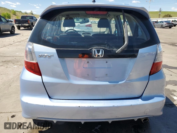2010 Honda Fit Sport с VIN JHMGE8H6XAS006965, выставлен на аукционе Copart как лот 58011325 с пробегом 113 064 миль миль и Списание • Salvage title. История ставок и продаж доступна на DreamBid. Изображение 6.